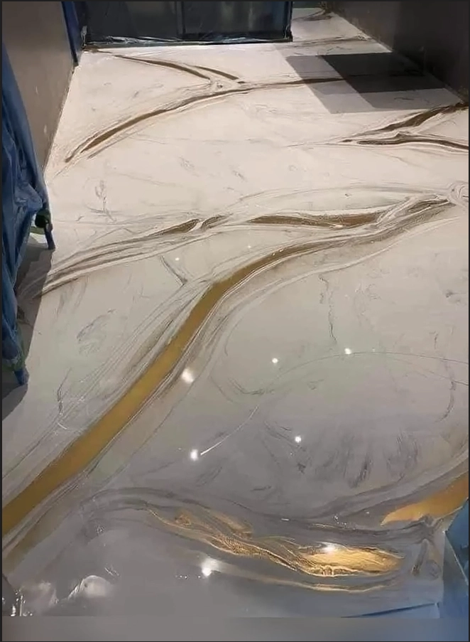 Piso epóxico metálico efecto mármol blanco y oro